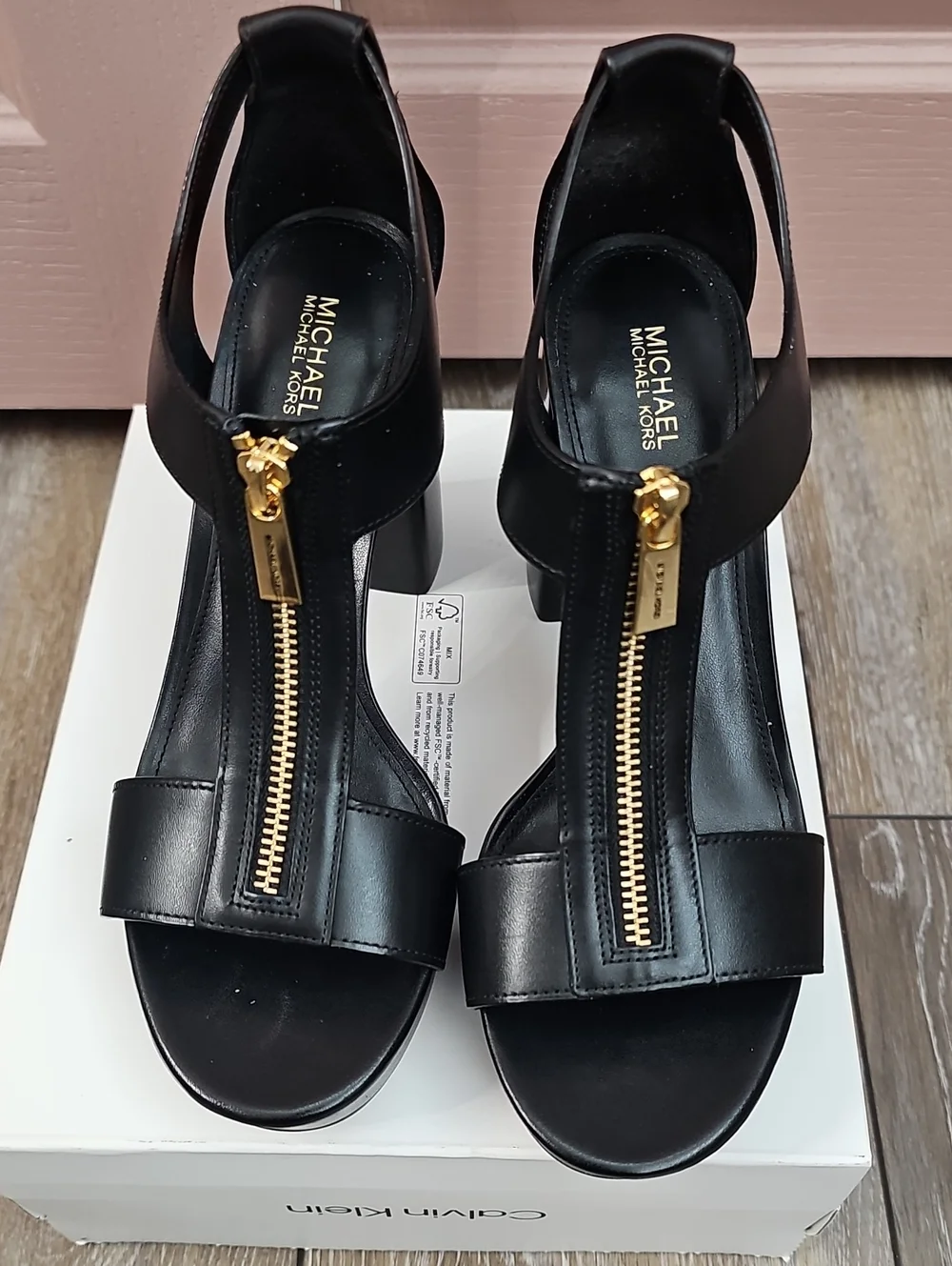 Michael Kors Black Leather T-Strap Sandals with Gold Zipper Accent